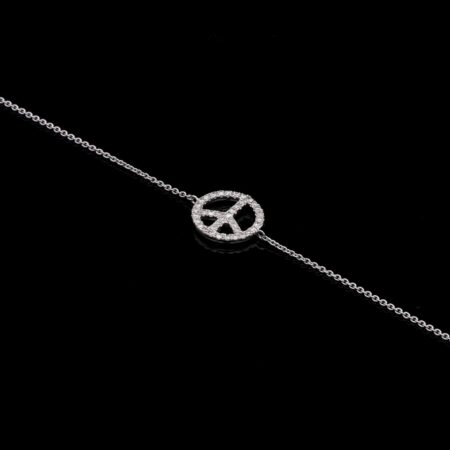 Peace sign bracelet in white gold with diamonds